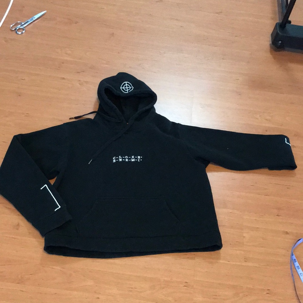 Close Enemi sweatshirt with embroidery detail and added ribbon on back
